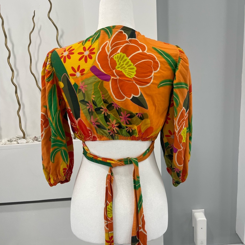 Vibrant Patchwork Blouse With Floral Accents - image 3